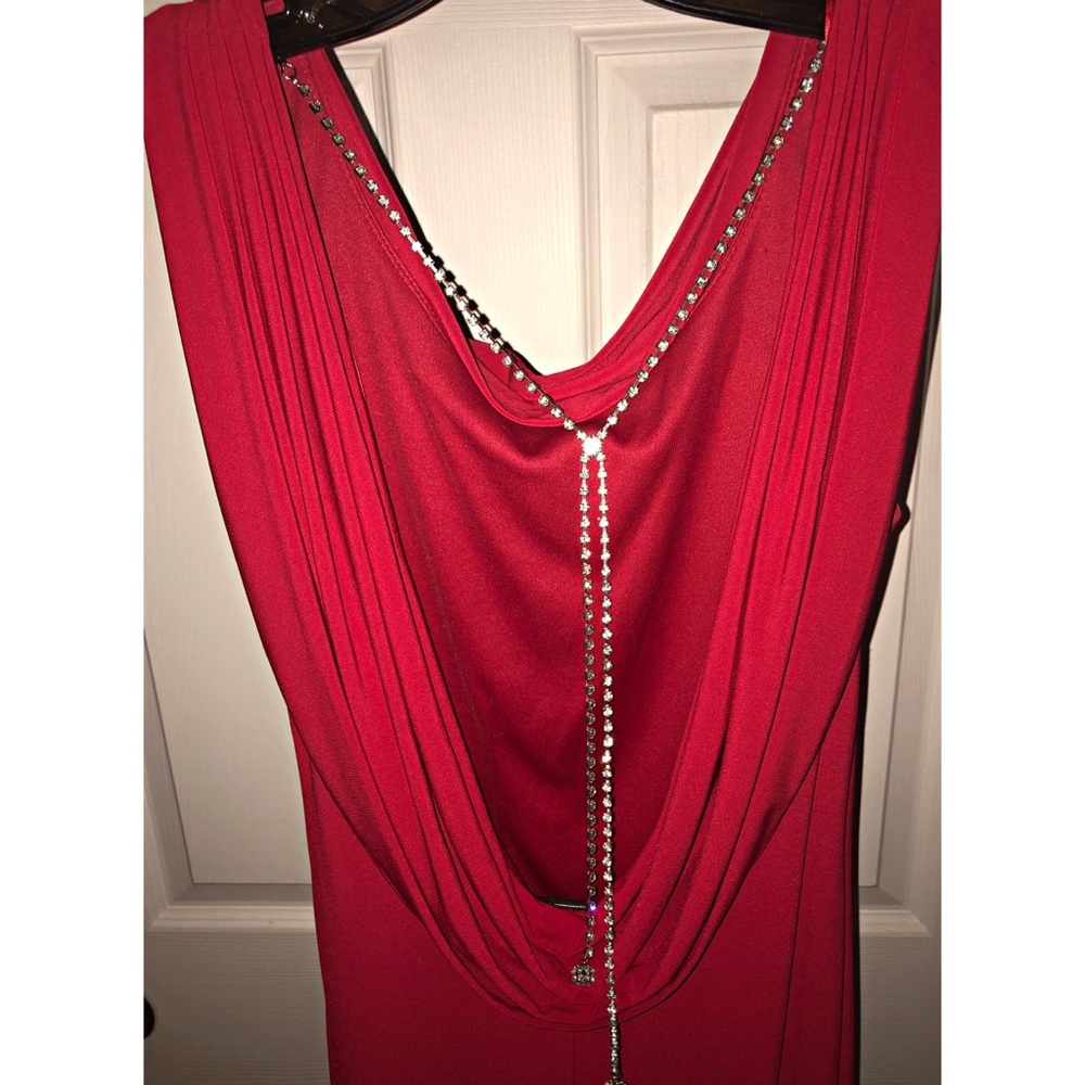 Sleeveless Red Gown with a diamond chain!